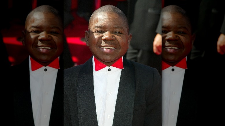 Gary Coleman in formal suit on red carpet