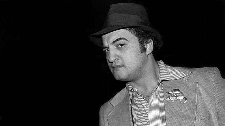 John Belushi wearing a porkpie hat