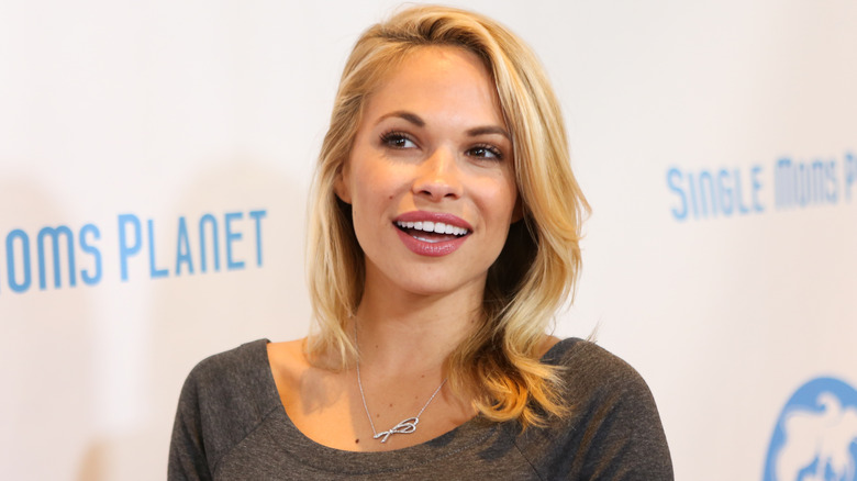 dani mathers smiling at awards event