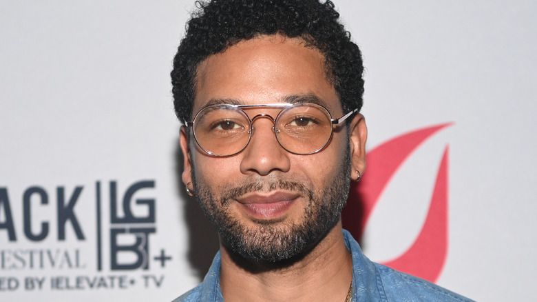 jussie smollett staring into camera glasses