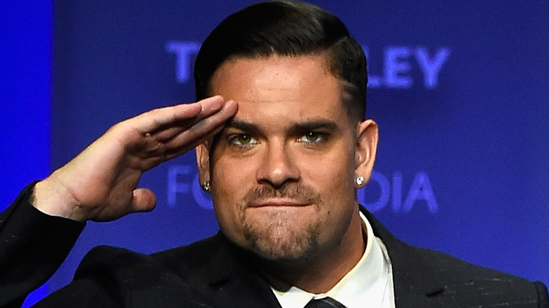 Mark Salling saluting