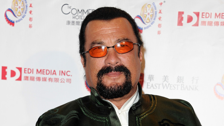 Steven Seagal goatee orange glasses