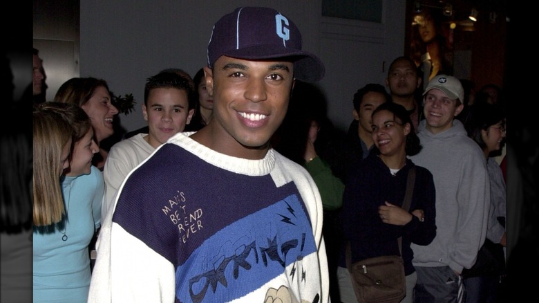 Merlin Santana smiling red carpet