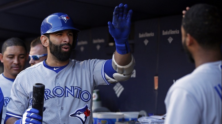 Jose Bautista giving high-five