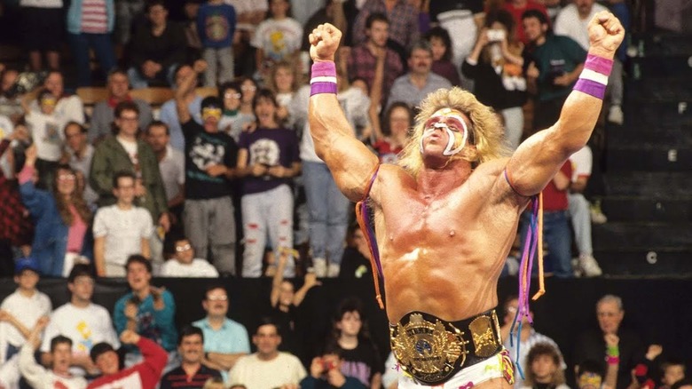 The Ultimate Warrior celebrating