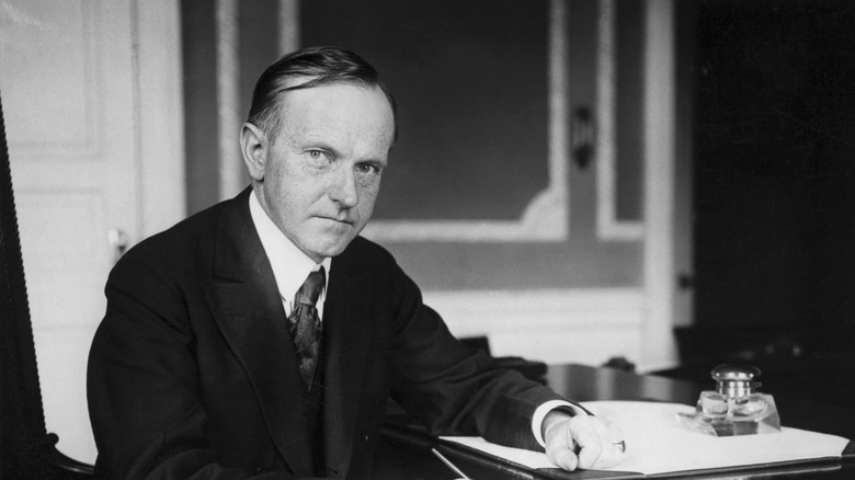 calvin coolidge at desk