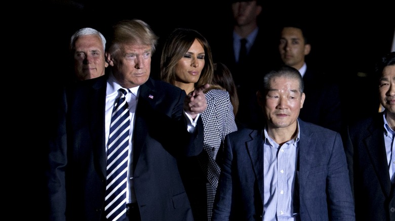 Donald Trump and Kim Don-chul walking