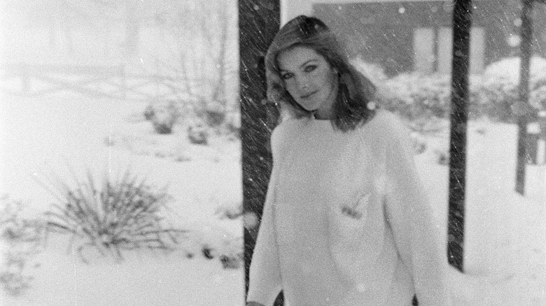 Priscilla Presley in snow at Graceland