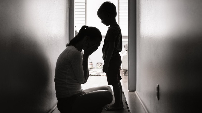 Depressed woman with child