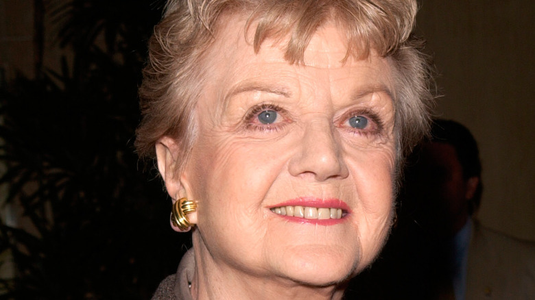 Angela Lansbury looking up smiling