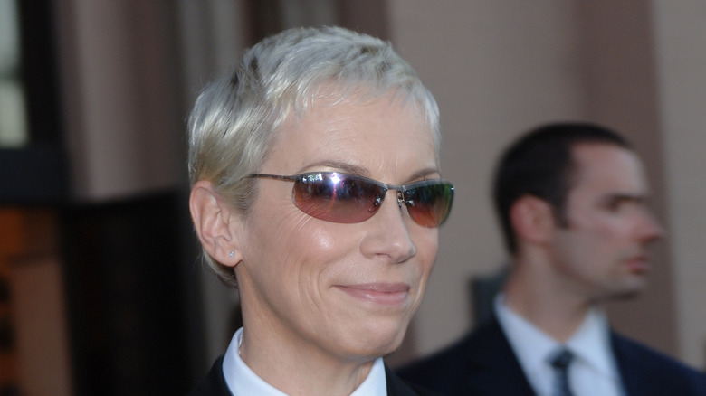 Annie Lennox with sunglasses smiling