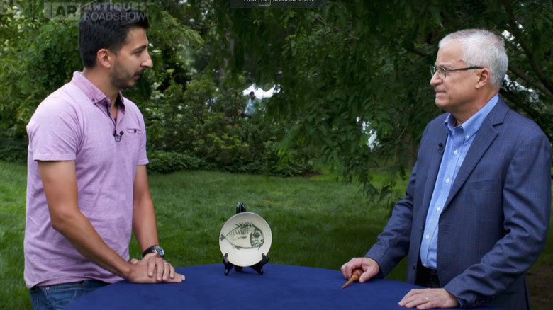 an antiques roadshow appraiser and a fan