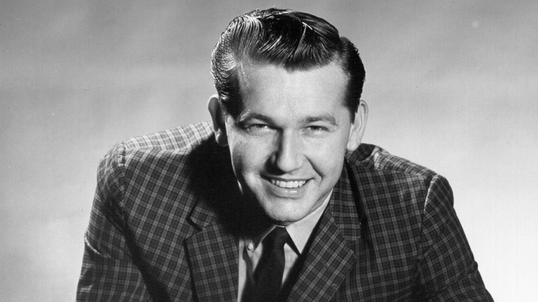 Floyd Cramer posing in a suit