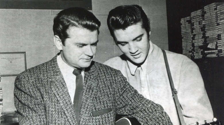 Sam Phillips and Elvis Presley in the studio