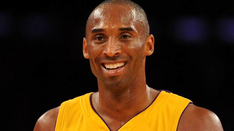 kobe bryant smiling sweating yellow jersey