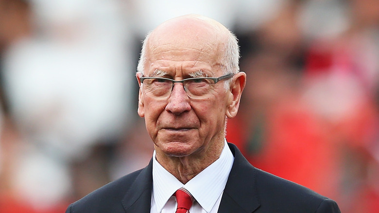 Bobby Charlton wearing a suit