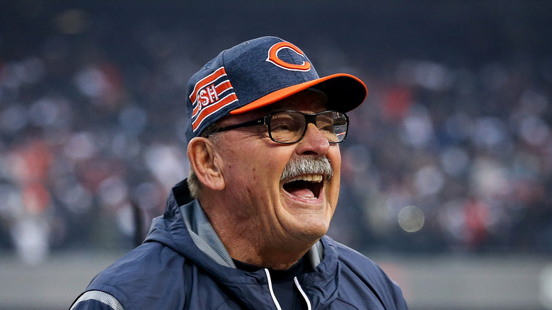 Dick Butkus laughing baseball cap mustache