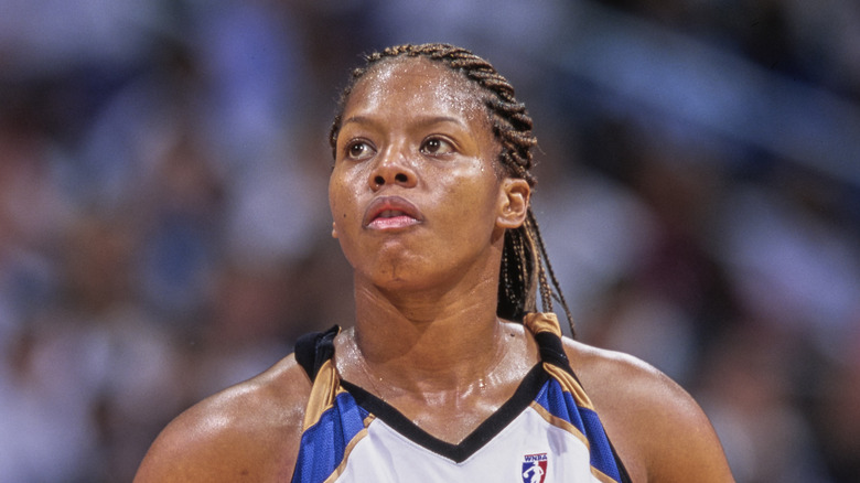 Nikki McCray-Penson in basketball uniform