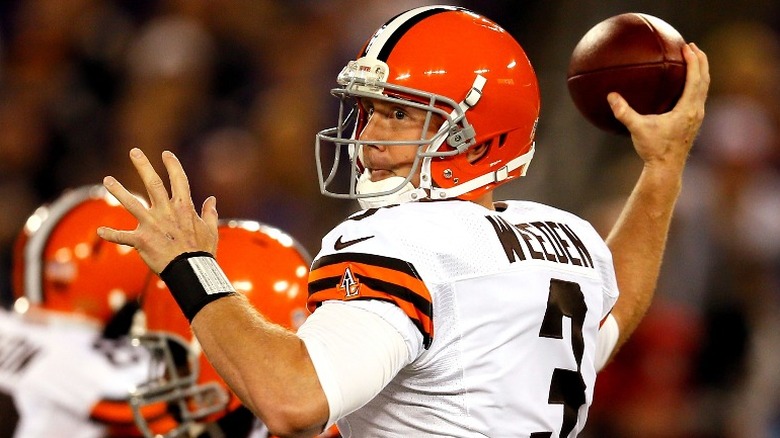 Brandon Weeden throwing a pass