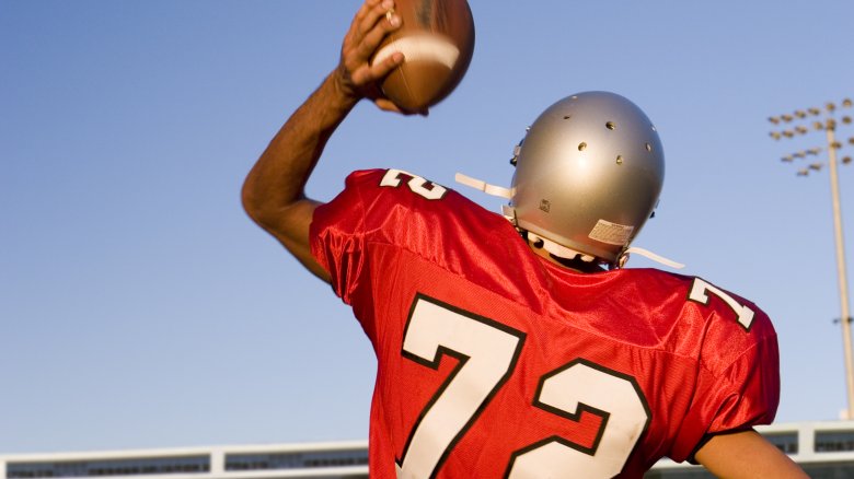 Quarterback throwing