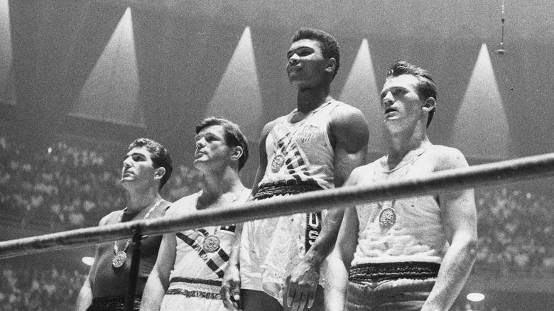 Muhammad Ali winning the gold at the 1960 Olympics