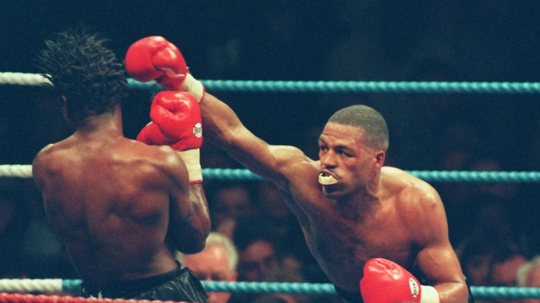 Gerald McClellan punching Nigel Benn boxing ring