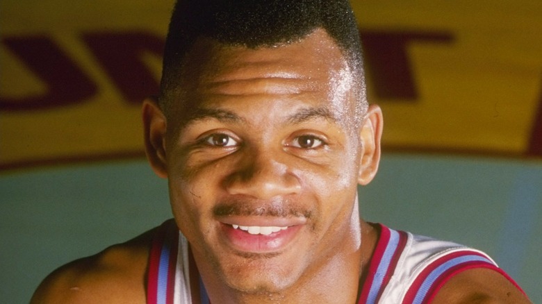 Hank Gathers smiling for a photo