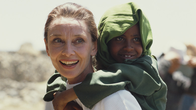 Audrey Hepburn visiting children with UNICEF