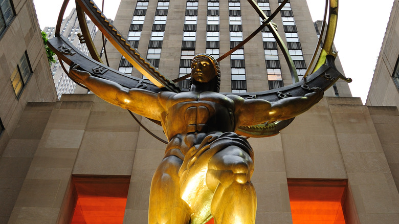 Randian statue of Atlas in front of business center