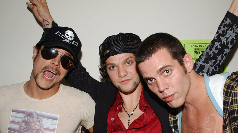 Bam Margera hugging Jackass cast