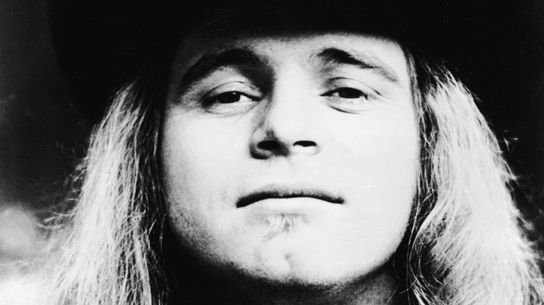 Close up black and white portrait of Ronnie Van Zant of lynyrd skynrd