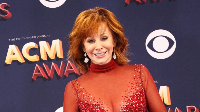 reba mcentire in red at the ACM Awards