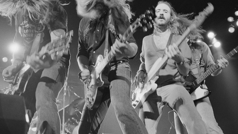 Molly Hatchet on stage 80s long hair and guitars