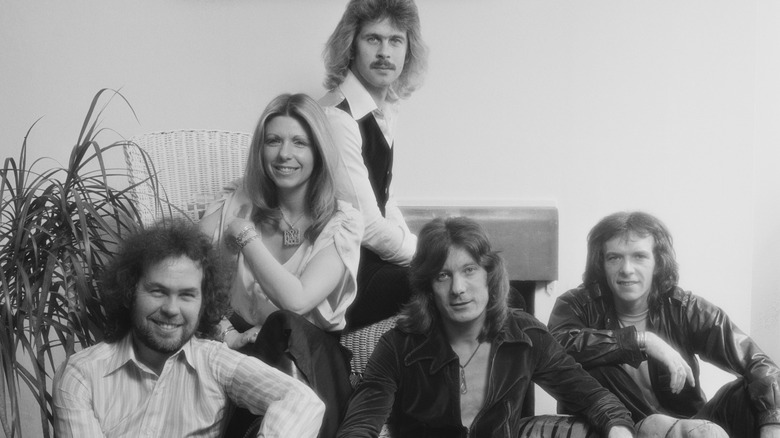 70s black and white Renaissance band smiling