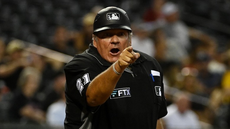 Umpire pointing and yelling