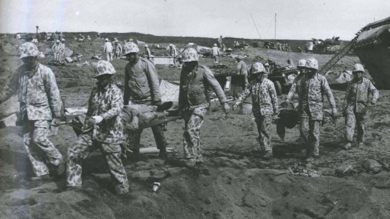 Marines carrying wounded on stretcher