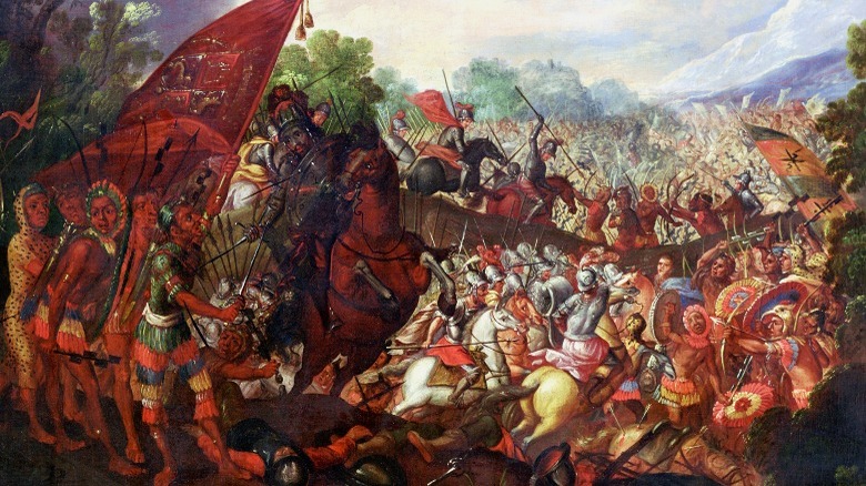 Cortes fighting on horseback painting