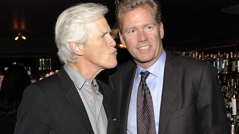 Keith Morrison and Chris Hansen in suits in bar