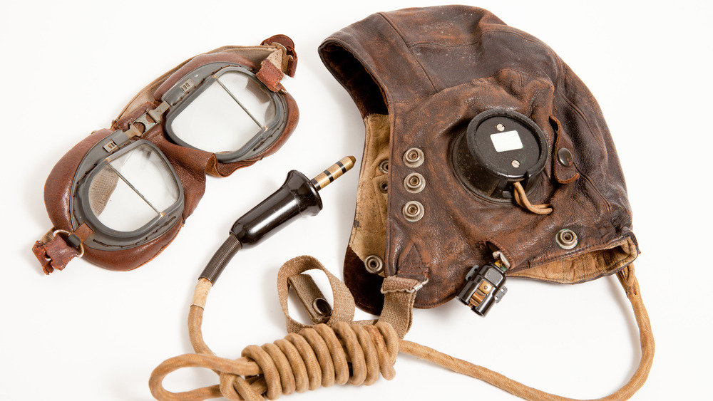 Vintage flying goggles and helmet