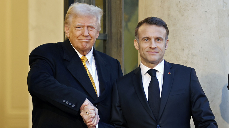 Donald Trump shaking hands with French president Emmanuel Macron