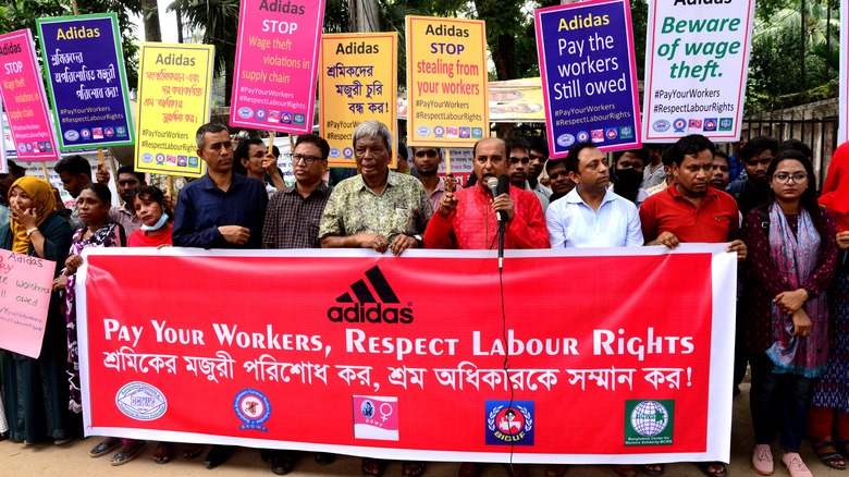 Workers protesting against Adidas