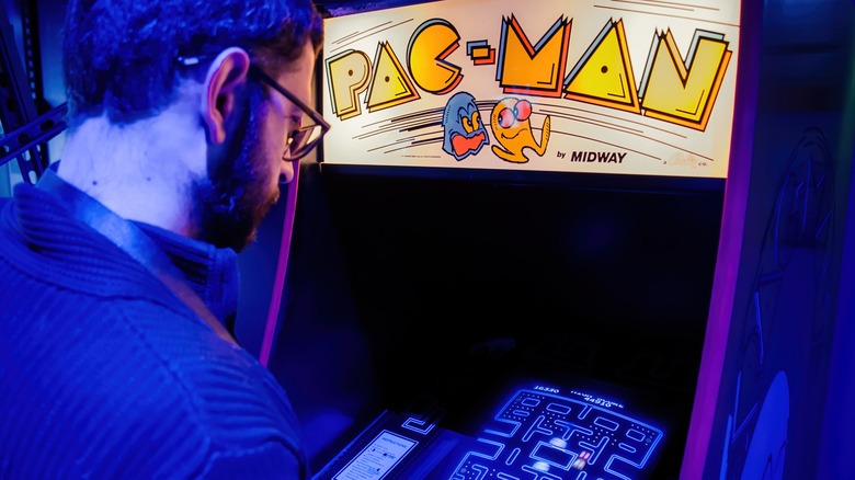 Man playing Pac-Man