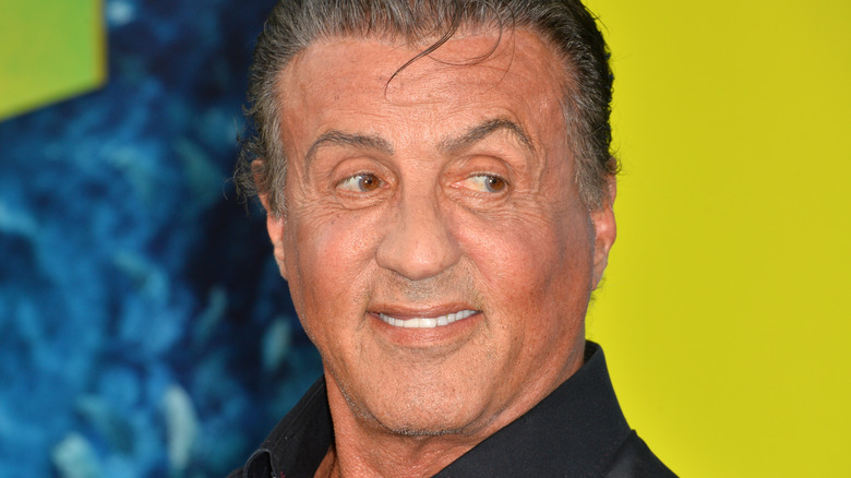 Sylvester Stallone grinning