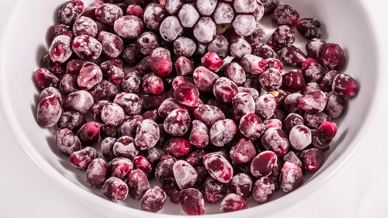 Frozen pomegranates in a bowl