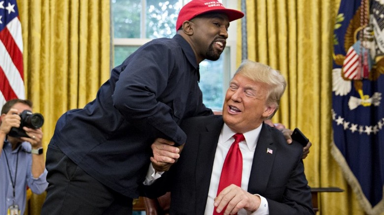 Kanye West hugging Donald Trump