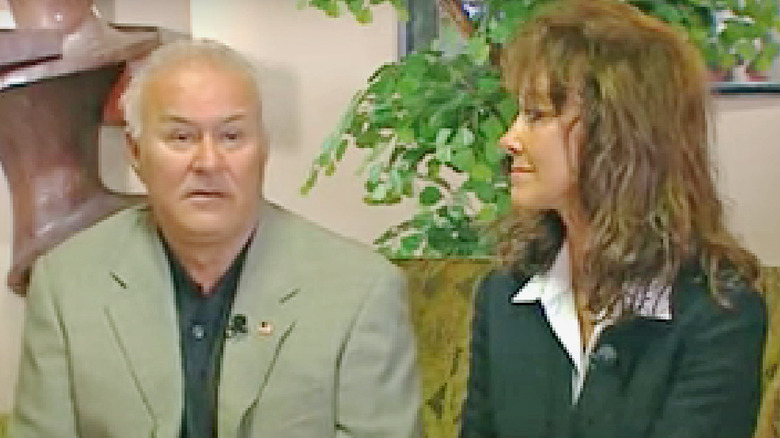 Ken Henricks seated with wife Diane