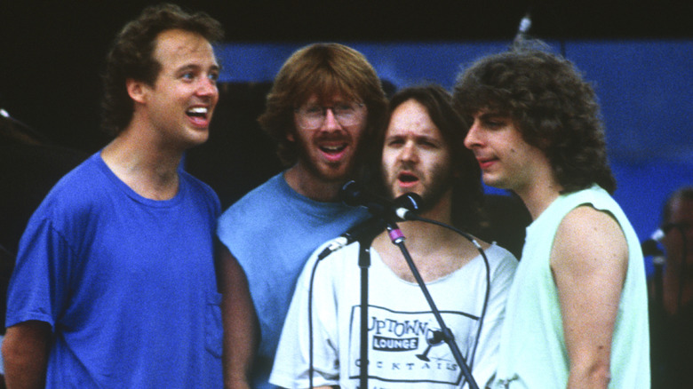 Phish harmonize on stage