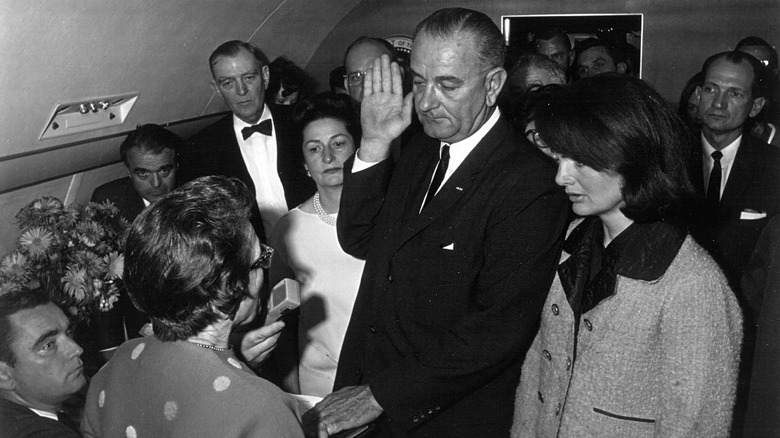 Lyndon B. Johnson being sworn in as President