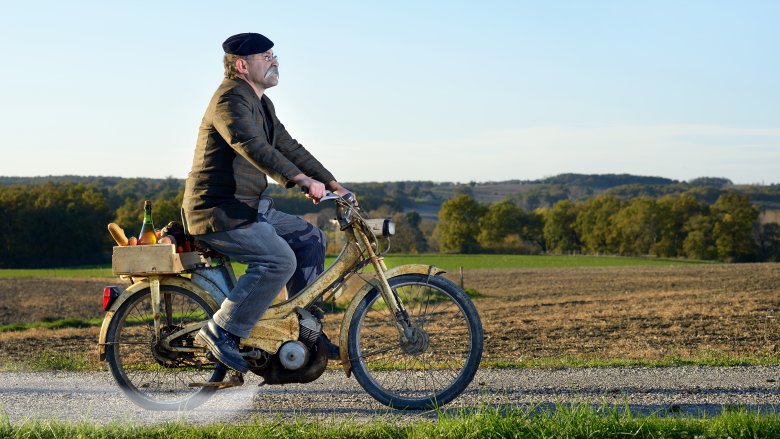 french farmer on bicycle