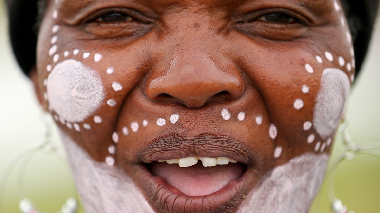 A Xhosa woman sings at Nelson Mandela's funeral